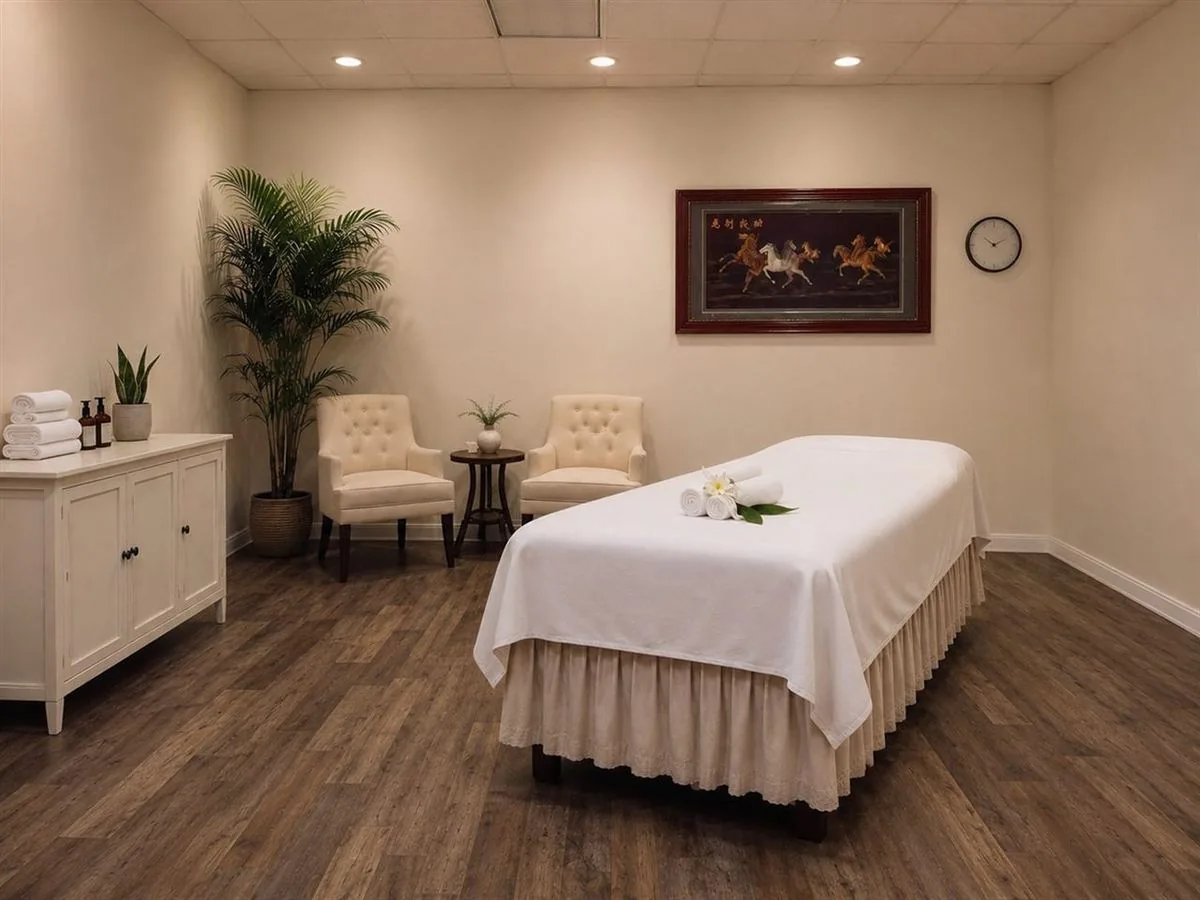 Private massage room with seating at Long Term Health Club Massage in Fresno CA