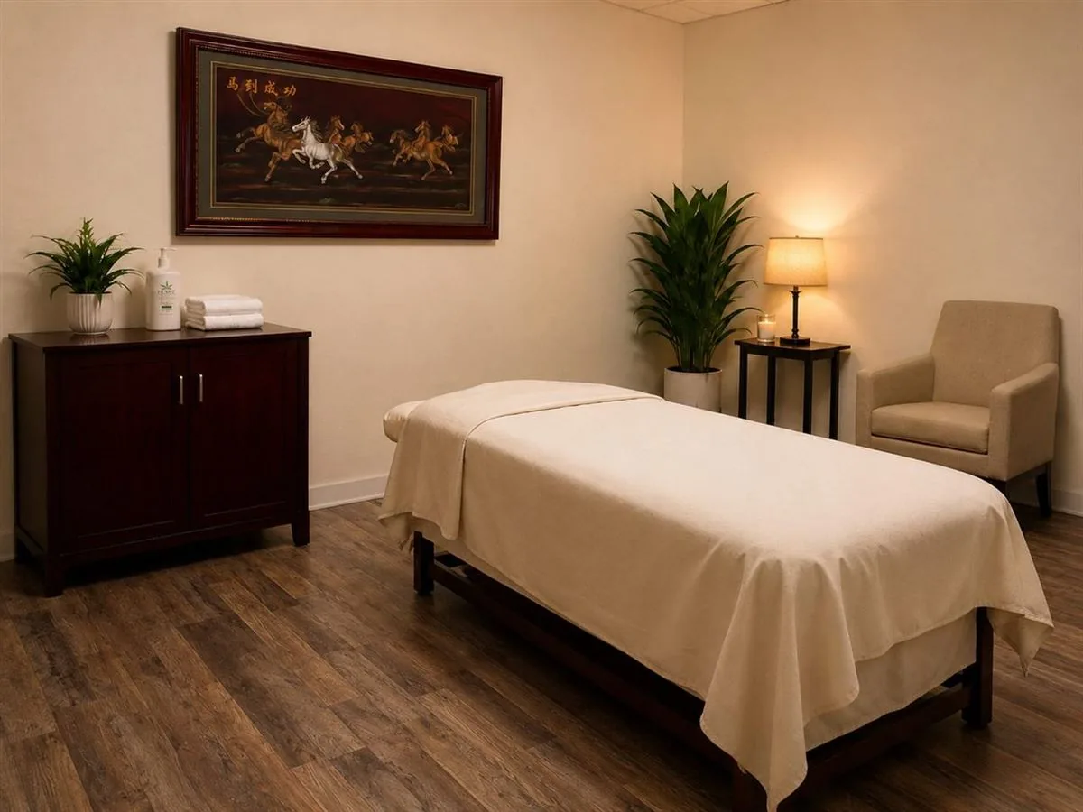 Comfortable massage room with soft lighting at Long Term Health Club Massage in Fresno CA
